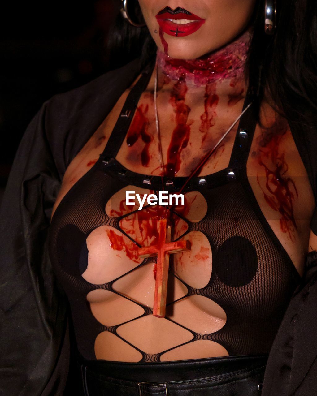 women, one person, adult, blood, flesh, halloween, portrait, clothing, spooky, female, indoors, young adult, make-up, fashion, horror, fear, front view, person, night, dark, evil, black, red, human mouth, looking at camera, celebration