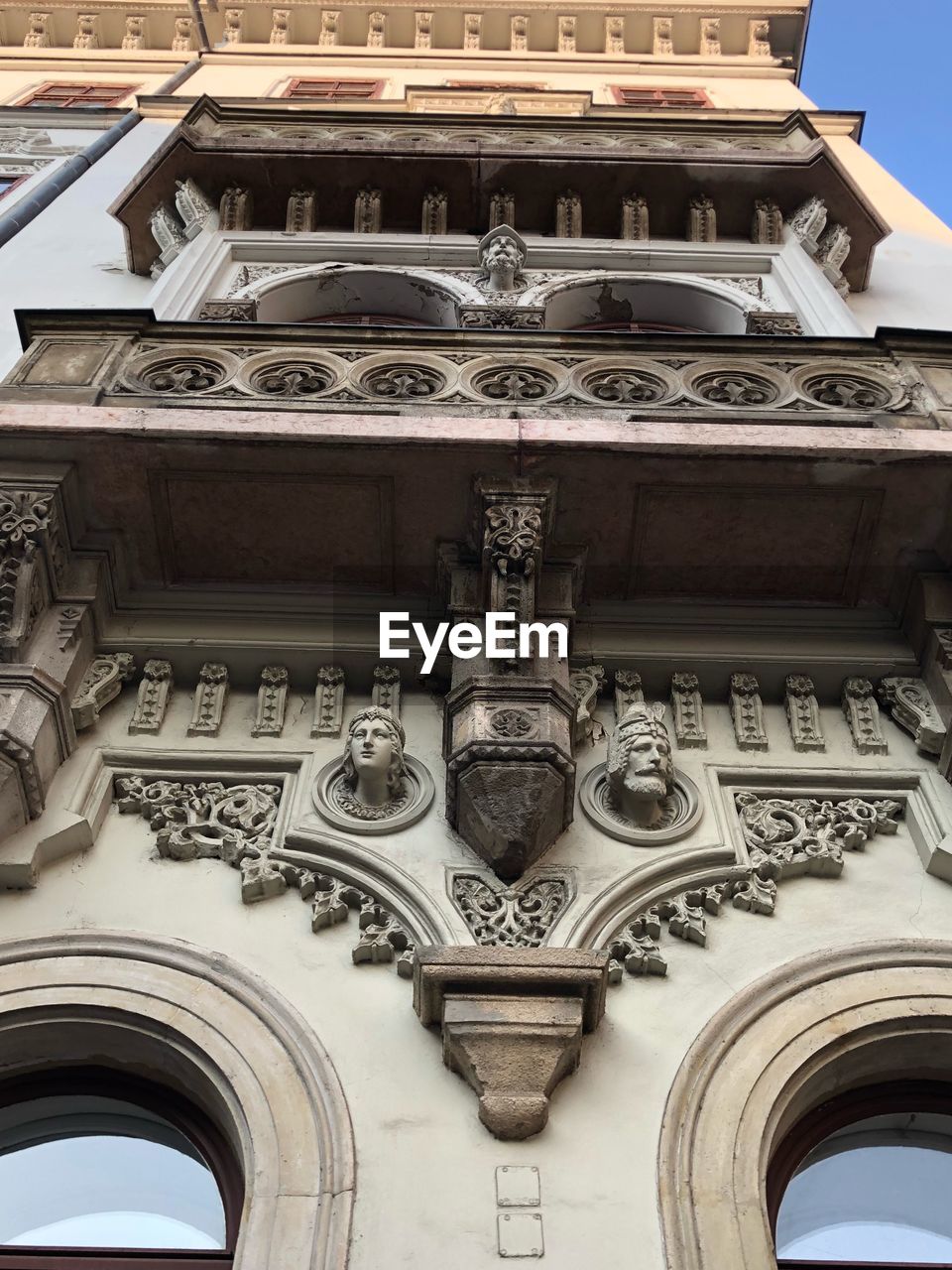 LOW ANGLE VIEW OF BELL TOWER OF BUILDING