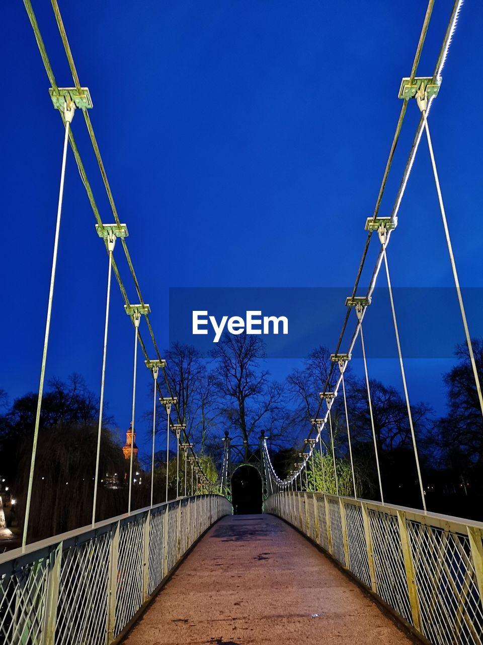 BRIDGE AGAINST BLUE SKY