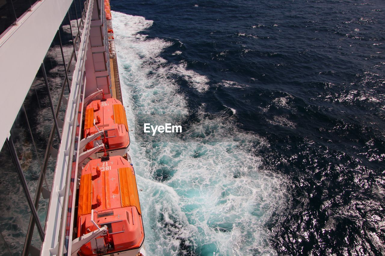 High angle view of ship sailing in sea