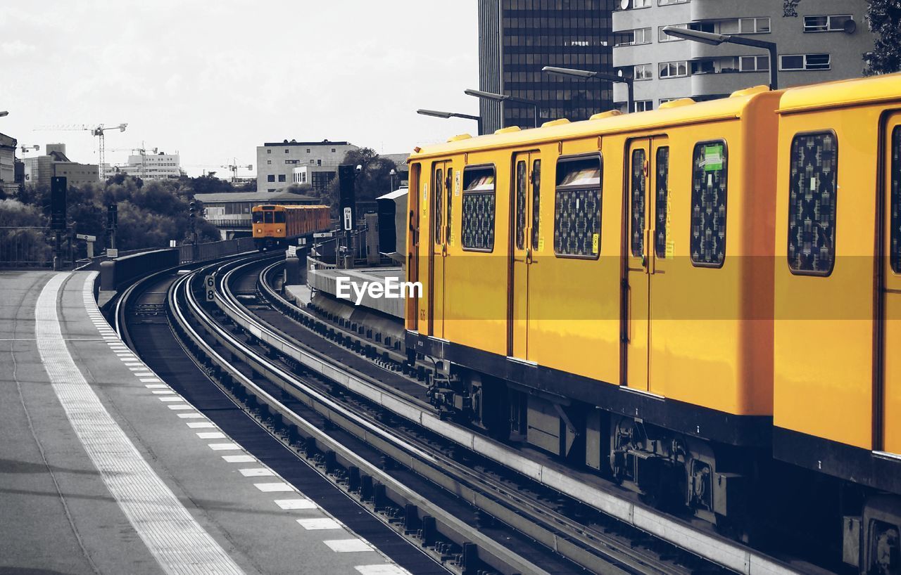 Train moving on tracks at station