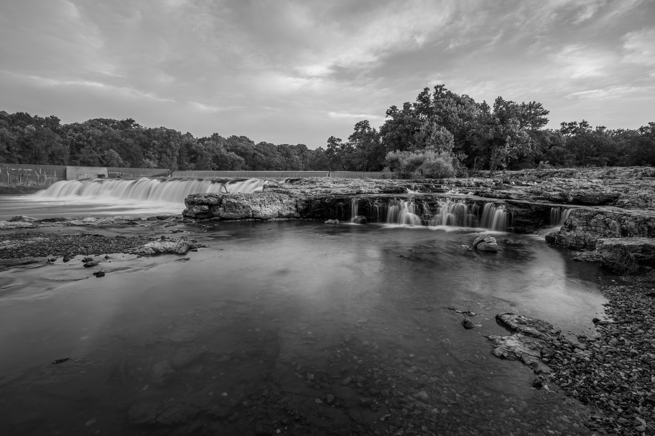water, sky, cloud, black and white, reflection, nature, environment, monochrome, tree, monochrome photography, landscape, scenics - nature, plant, land, beauty in nature, river, no people, travel destinations, outdoors, rock, travel, tranquility, darkness, architecture