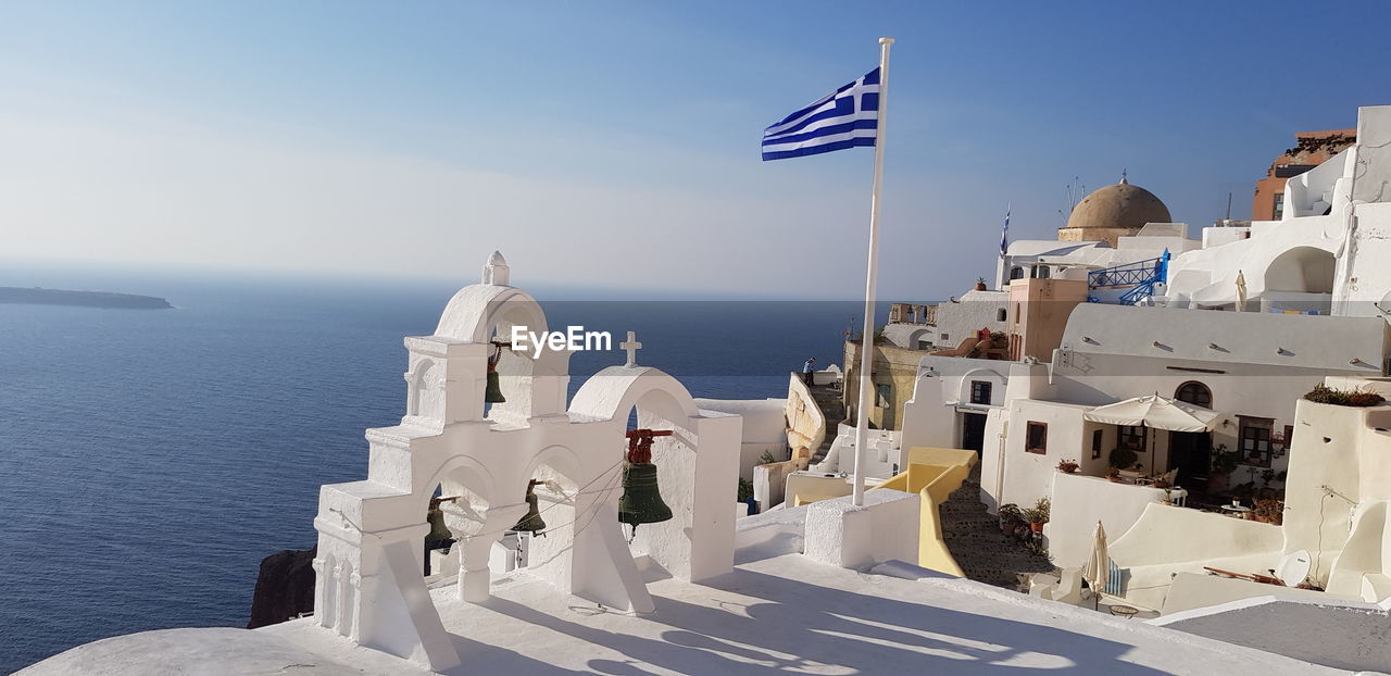 PANORAMIC VIEW OF SEA AGAINST BUILDINGS