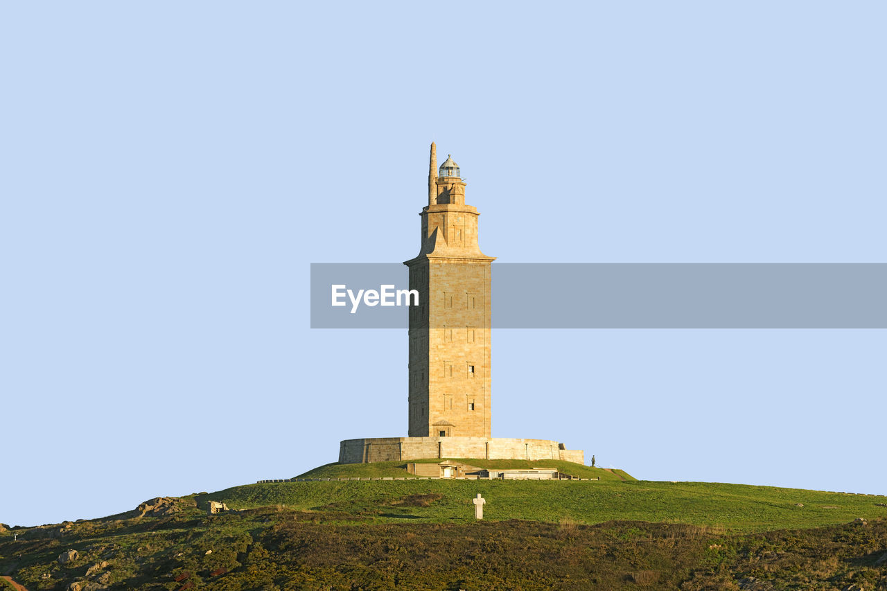 Tower of hercules against clear blue sky