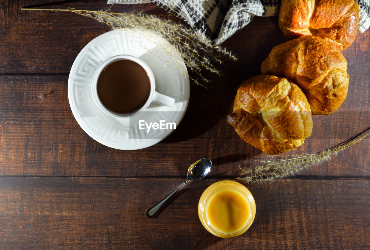 Croissant, homemade butter caramel and hot chocolate