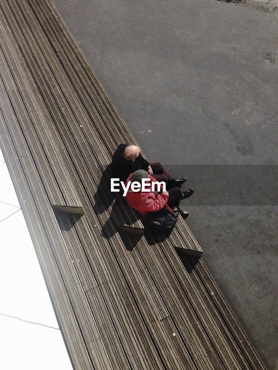 High angle view of senior couple sitting together