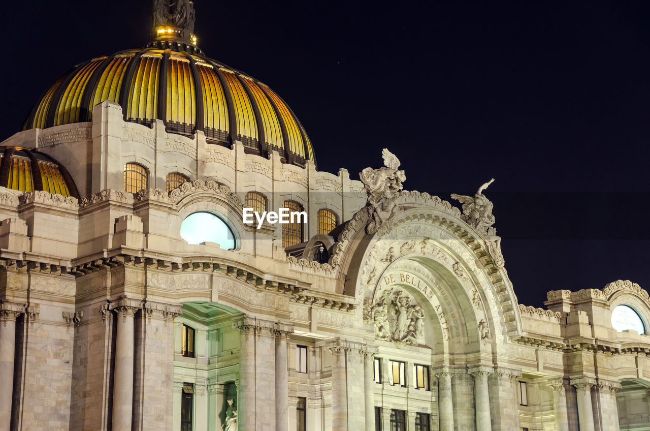 Low angle view of palacio de bellas artes against clear sky