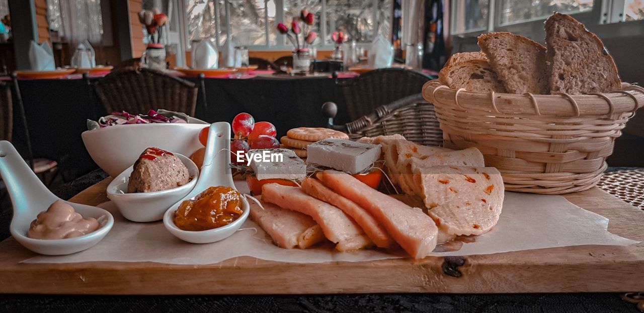 CLOSE-UP OF BREAKFAST IN BASKET