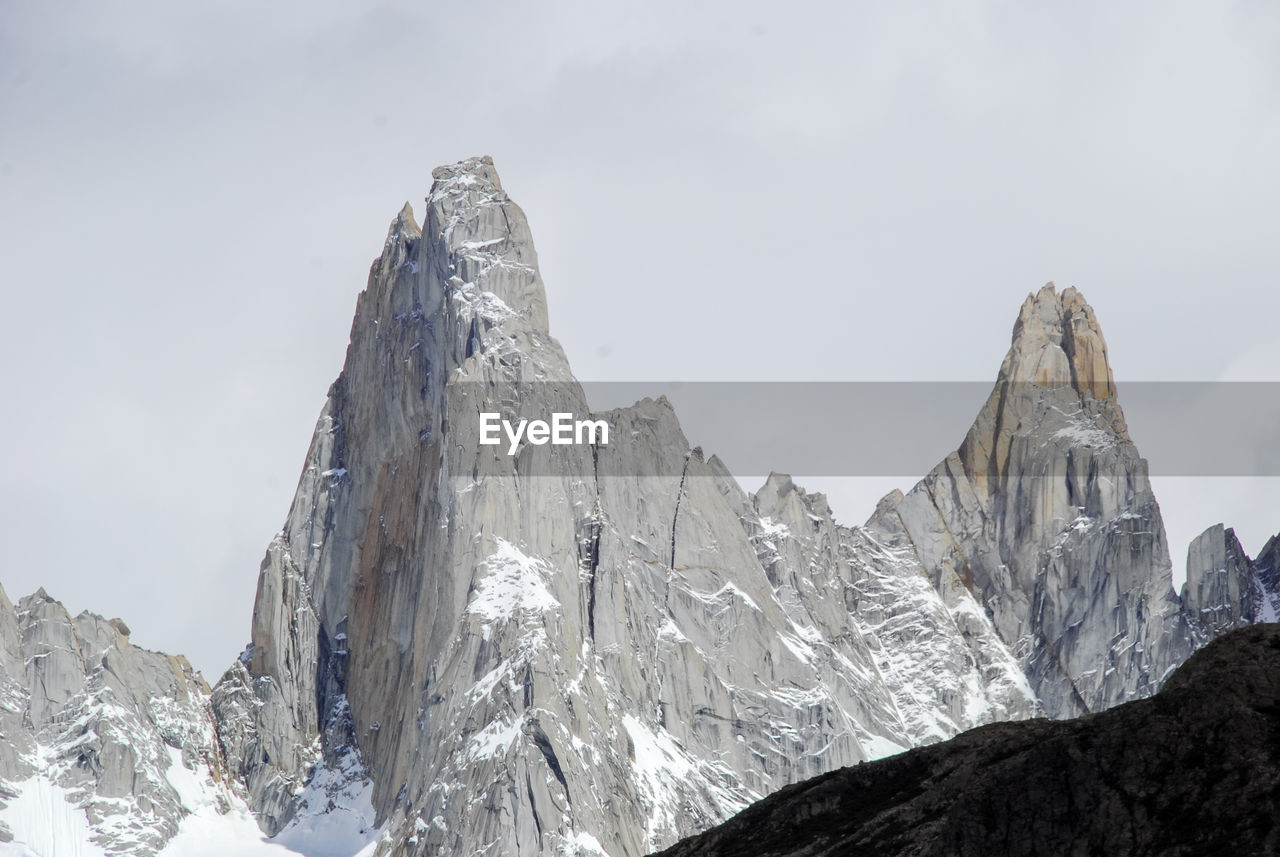 SCENIC VIEW OF SNOWCAPPED MOUNTAIN AGAINST SKY