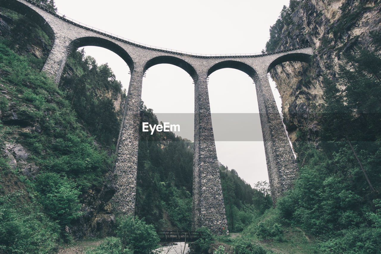 Low angle view of landwasser viaduct against clear sky