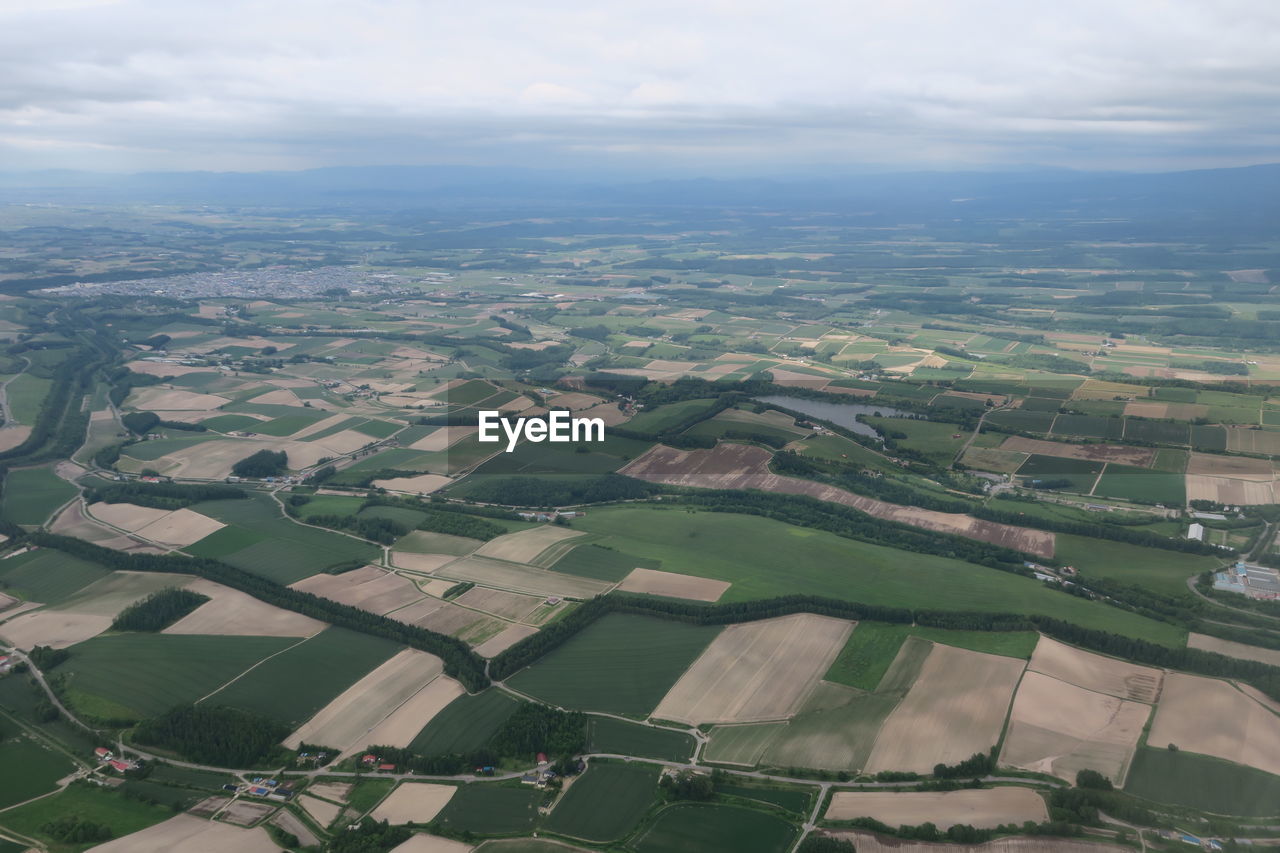 High angle view of agricultural field against sky