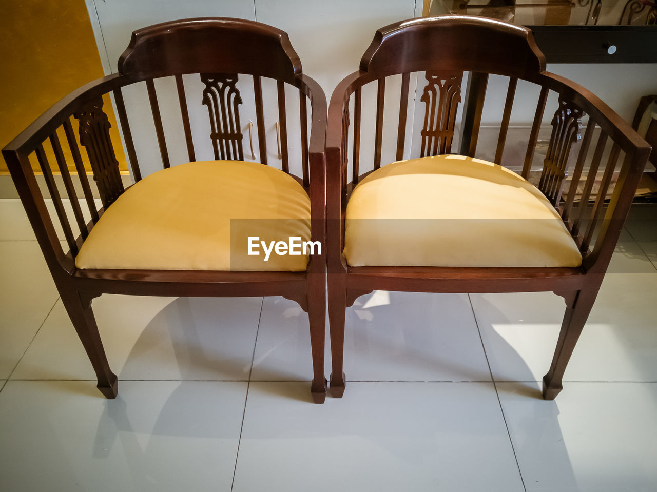 Wooden chairs with comfortable seating with pads made from jati. also known as tectona grandis.