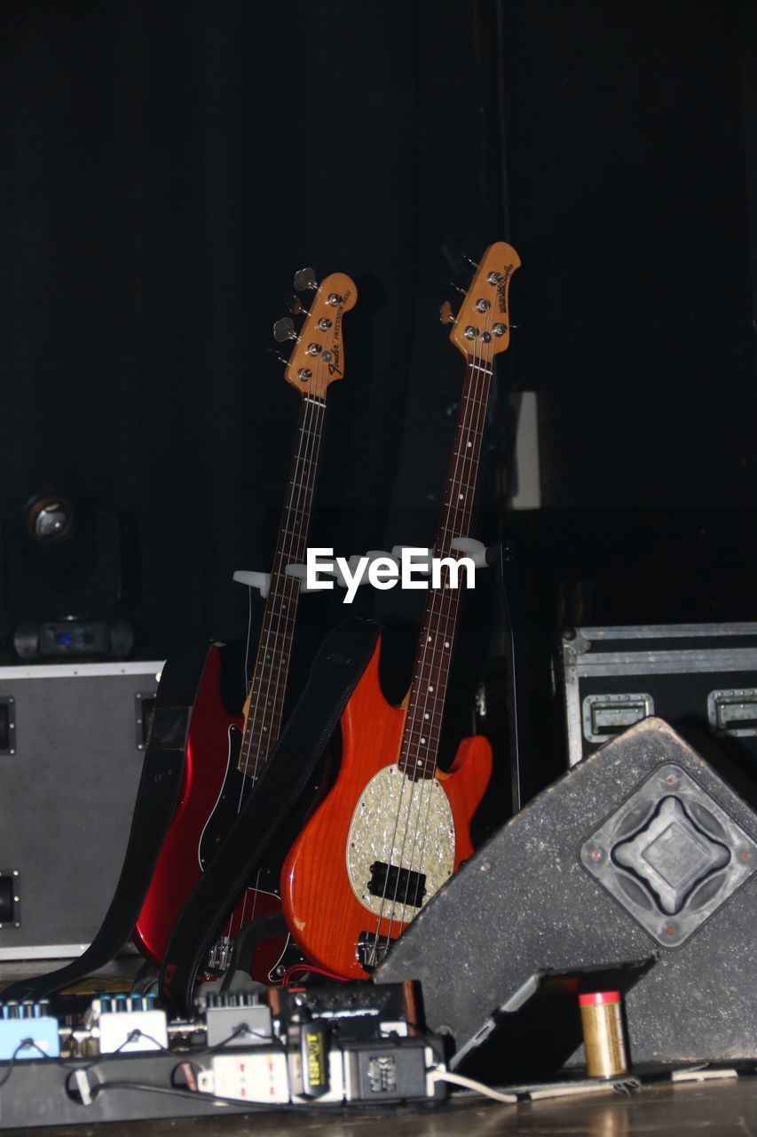 CLOSE-UP OF GUITAR AT HOME