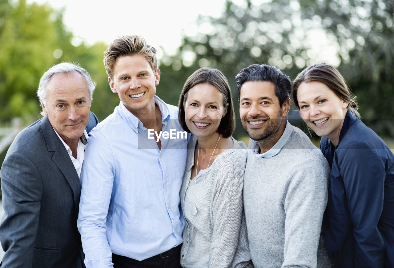 Group portrait of business people outdoors