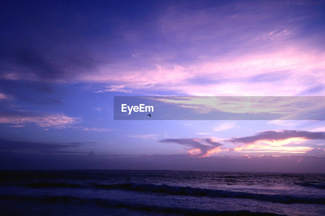 SCENIC VIEW OF SEA DURING SUNSET