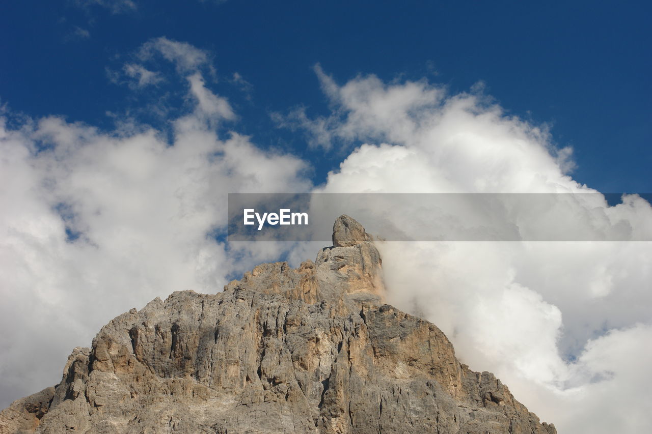 Low angle view of mountain against sky