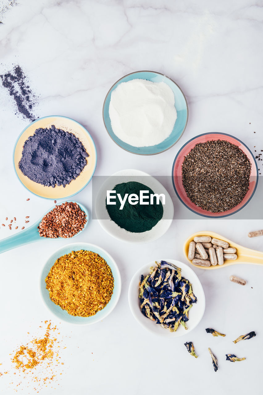 HIGH ANGLE VIEW OF FOOD ON TABLE AGAINST WHITE BACKGROUND