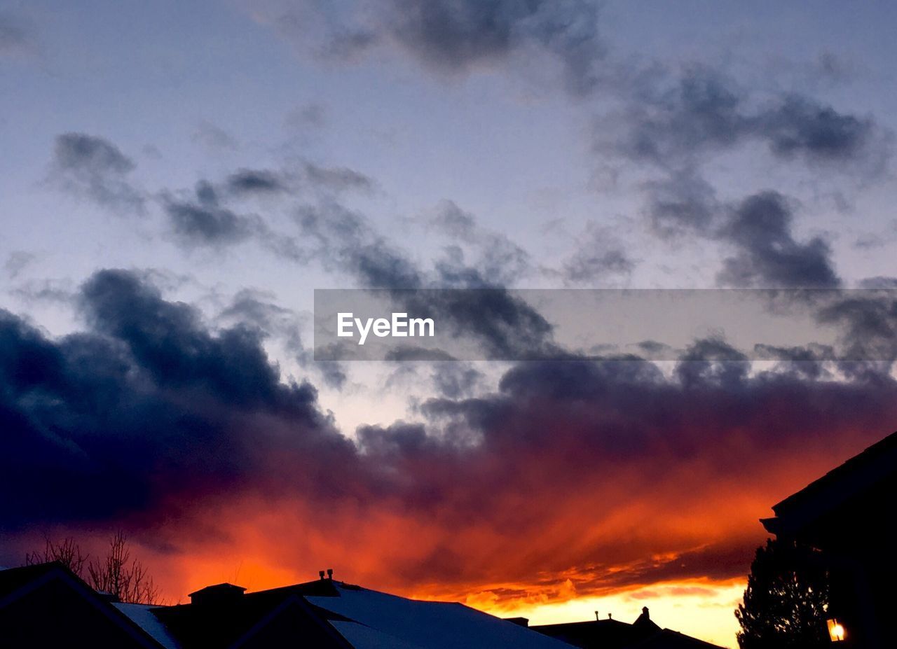 SILHOUETTE LANDSCAPE AGAINST SKY AT SUNSET