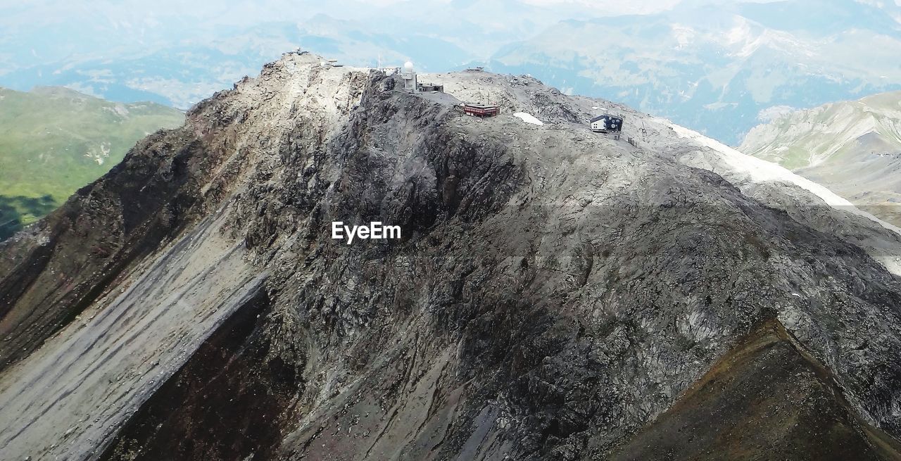 AERIAL VIEW OF SNOWCAPPED MOUNTAIN