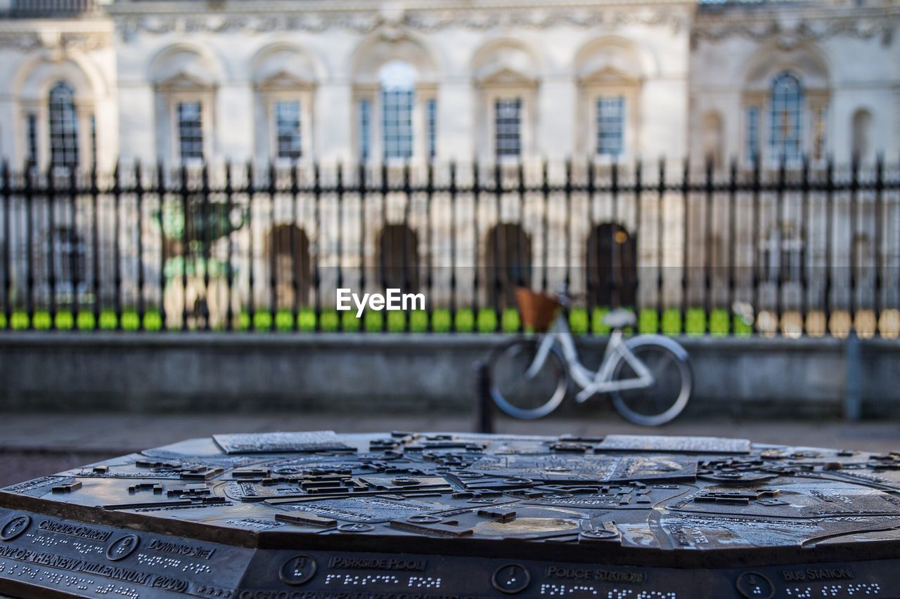 Close-up of metal structure against cambridge university