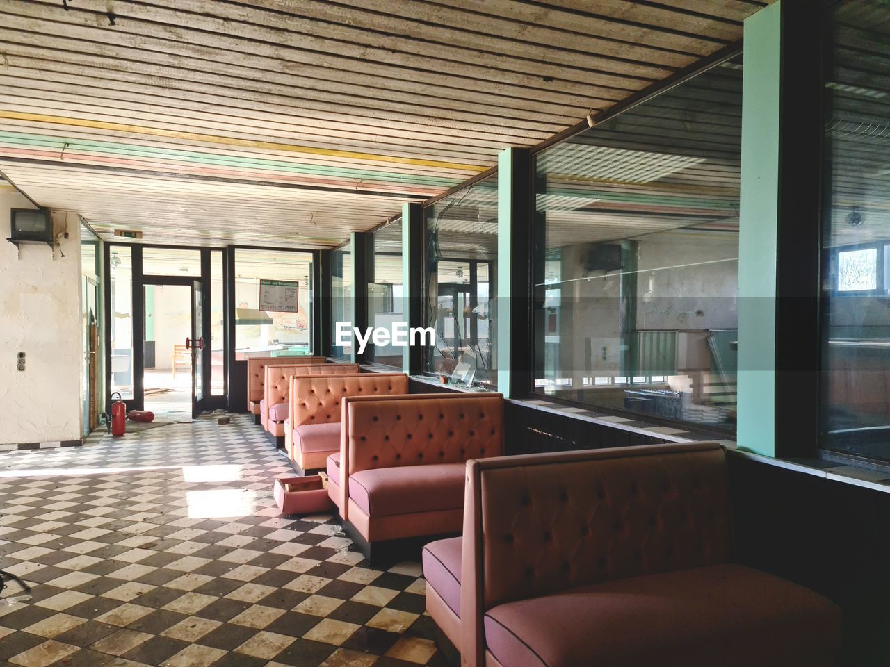 VIEW OF AN EMPTY CHAIRS IN BUILDING