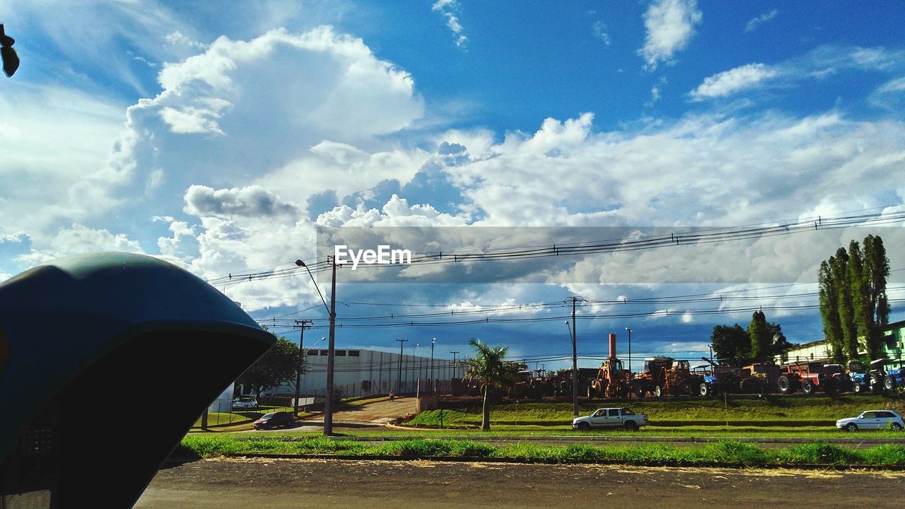 VIEW OF GREEN LANDSCAPE AGAINST SKY