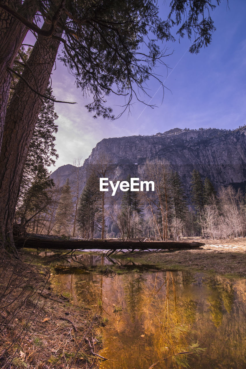 View of lake with mountain range in background