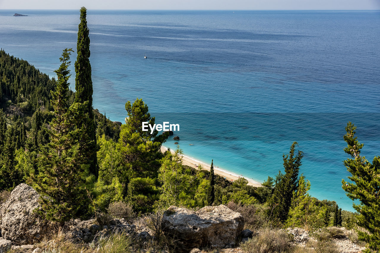 High angle view of rocks by sea