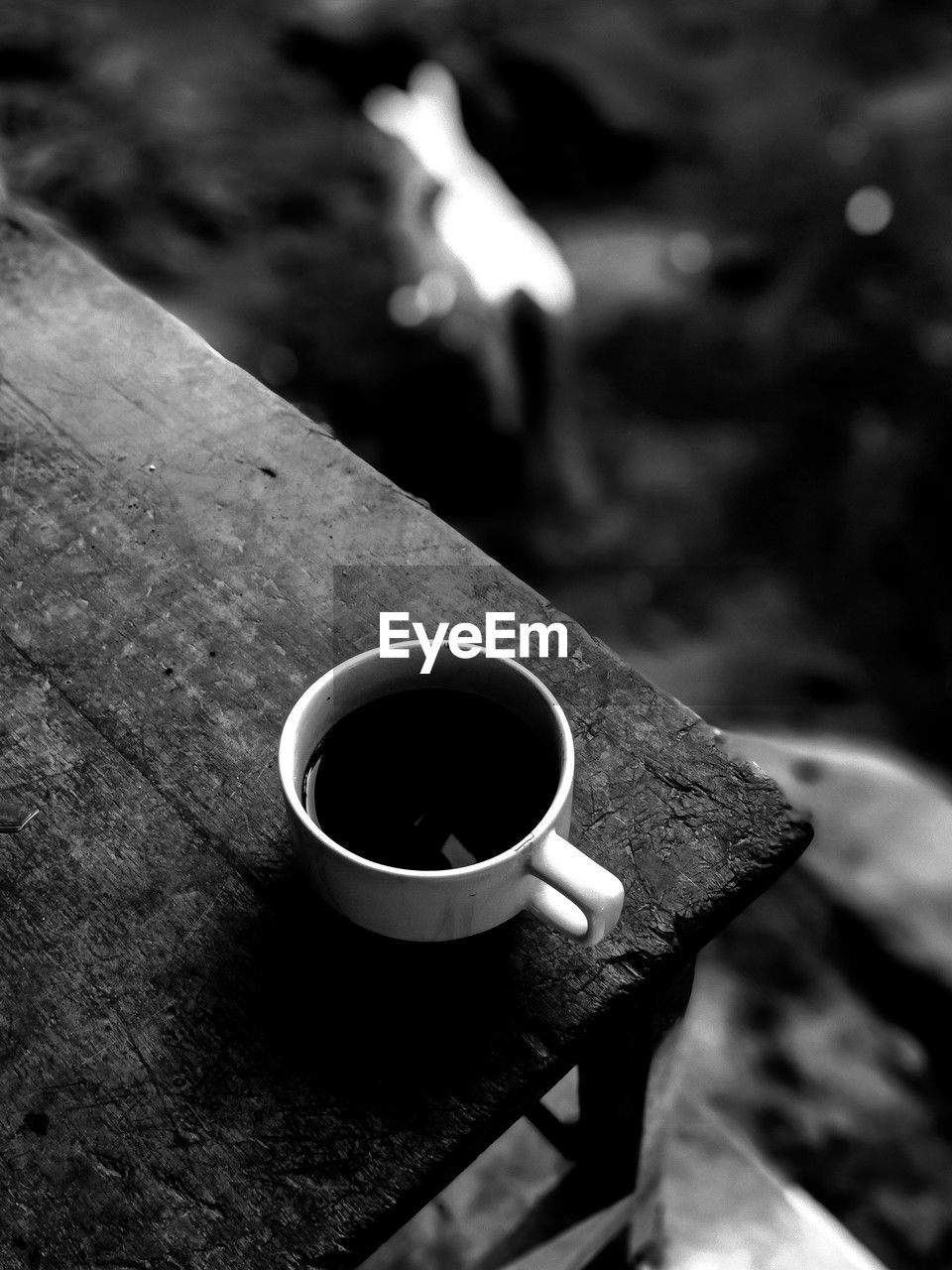 black, black and white, white, monochrome, monochrome photography, darkness, cup, drink, mug, close-up, coffee, focus on foreground, food and drink, coffee cup, refreshment, light, wood, macro photography, hot drink, no people, day, outdoors, high angle view