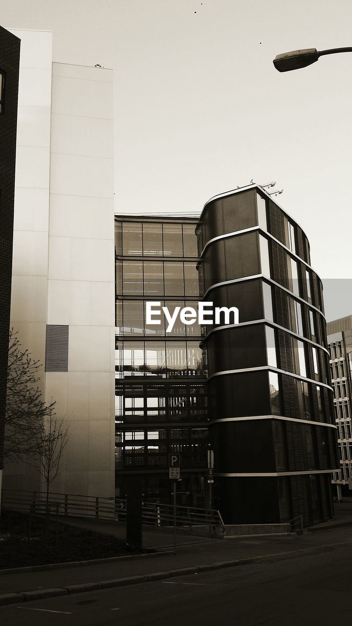 Exterior of modern buildings against clear sky