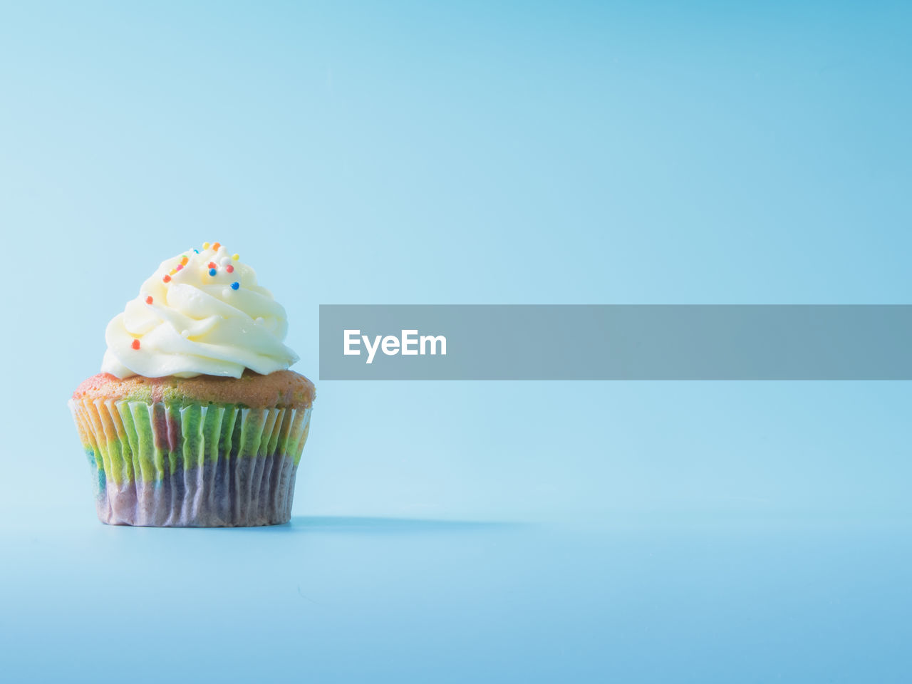 VIEW OF CUPCAKES AGAINST WHITE BACKGROUND