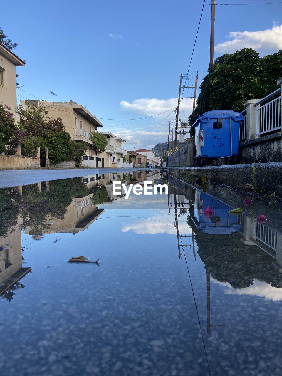 REFLECTION OF BUILDINGS ON RIVER