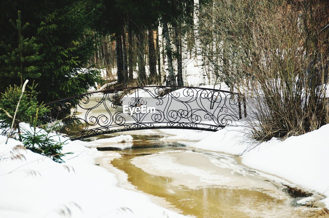 SCENIC VIEW OF FROZEN LAKE