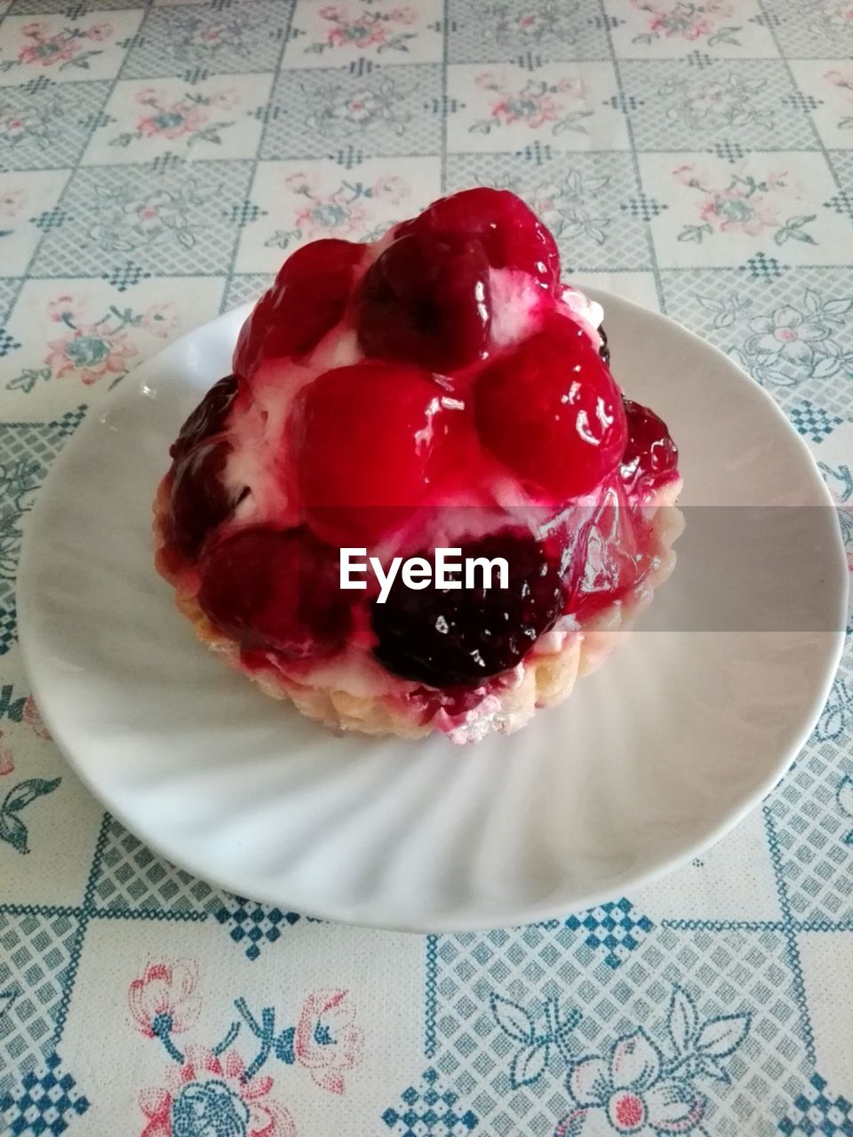 Close-up of fruit cake in plate on table