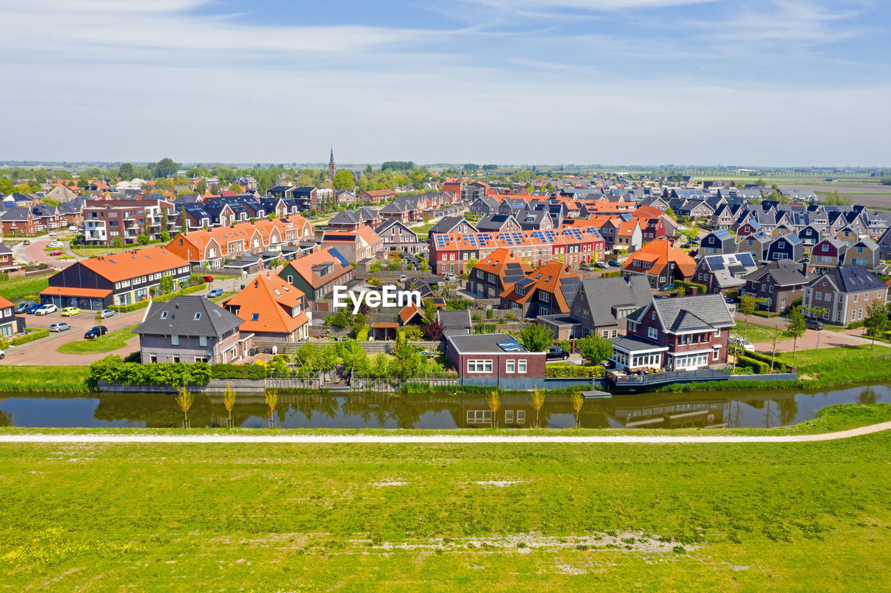 Aerial from the traditional village obdam in the countryside from the netherlands
