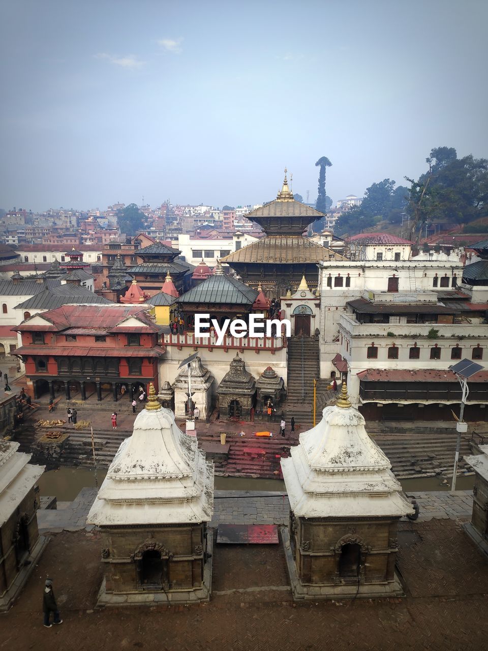 architecture, built structure, building exterior, building, religion, city, travel destinations, travel, belief, history, sky, town, the past, landmark, nature, tourism, spirituality, place of worship, ancient history, temple, temple - building, cityscape, tradition, ancient, outdoors, no people, roof, old, urban area, high angle view, residential district, landscape, environment, shrine, dome, cloud, business finance and industry, craft