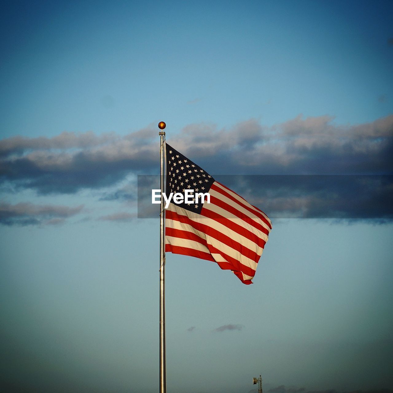 Low angle view of flag against sky