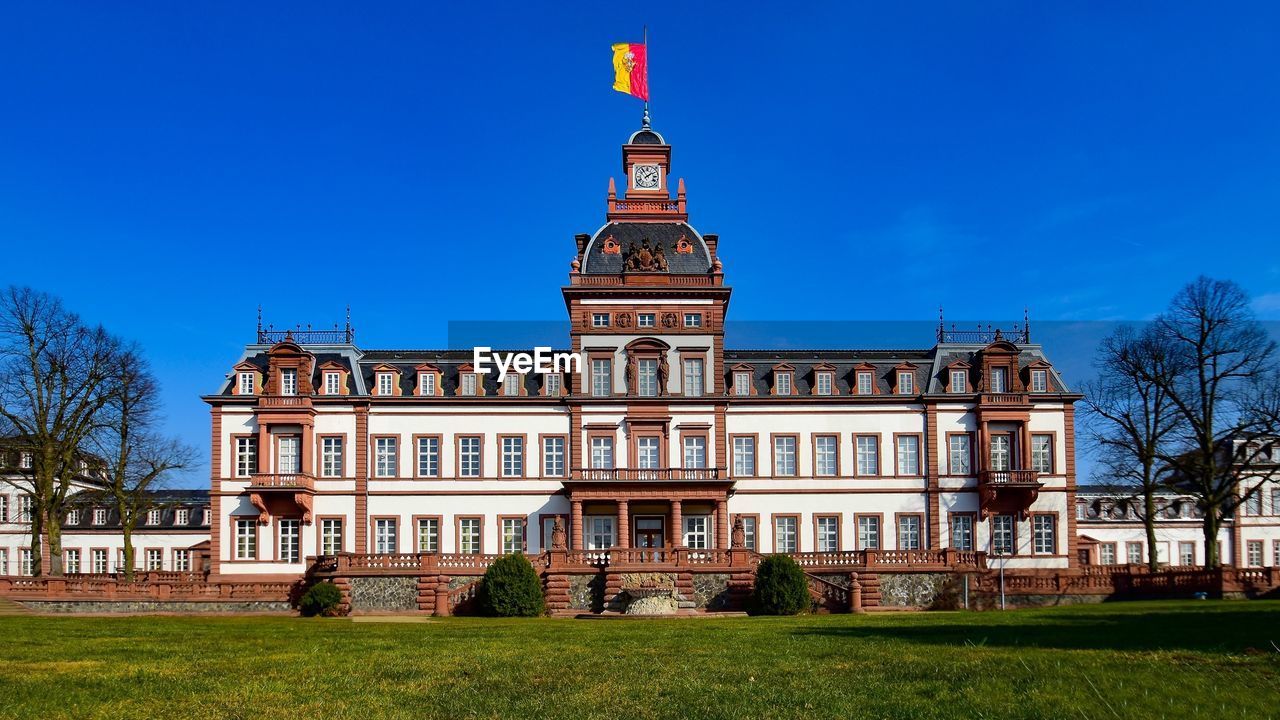 View of historical building against clear blue sky during sunny day