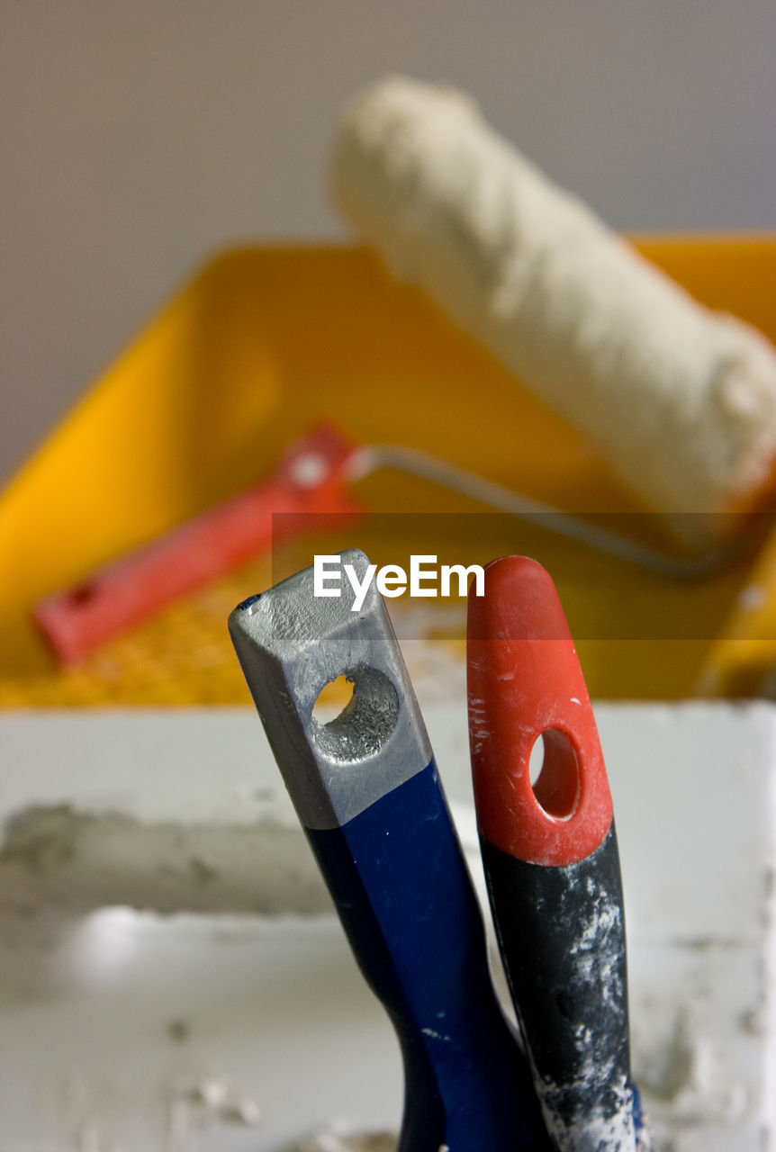 Close-up of paintbrushes on table