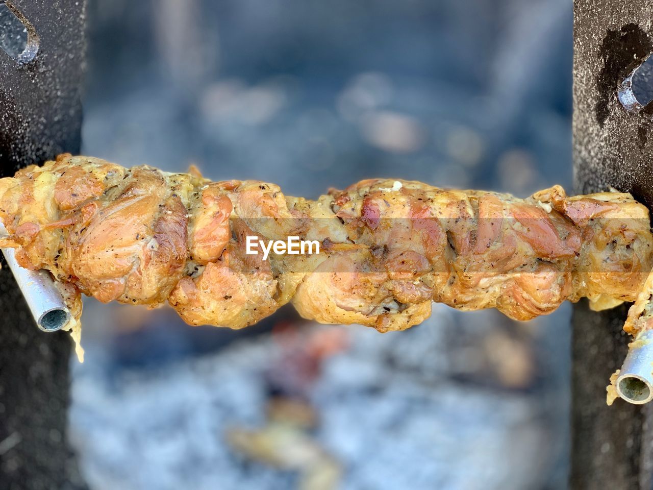 Close-up of meat on barbecue grill