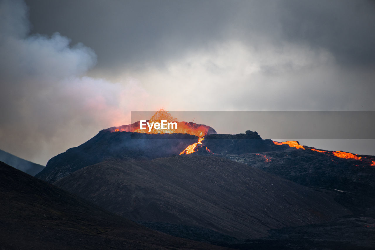 Scenic view of mountains against sky during sunset