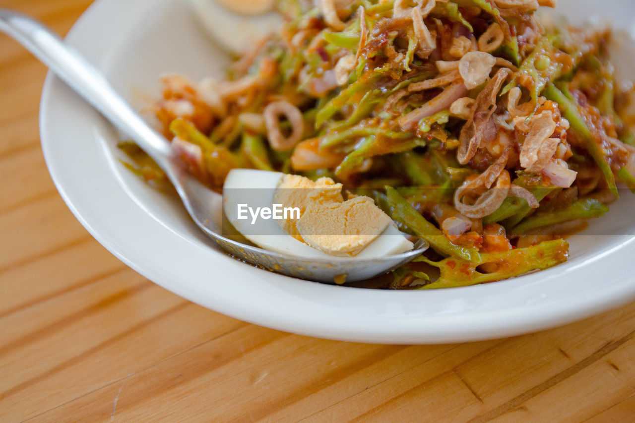 Spicy betel betel salad and boiled egg