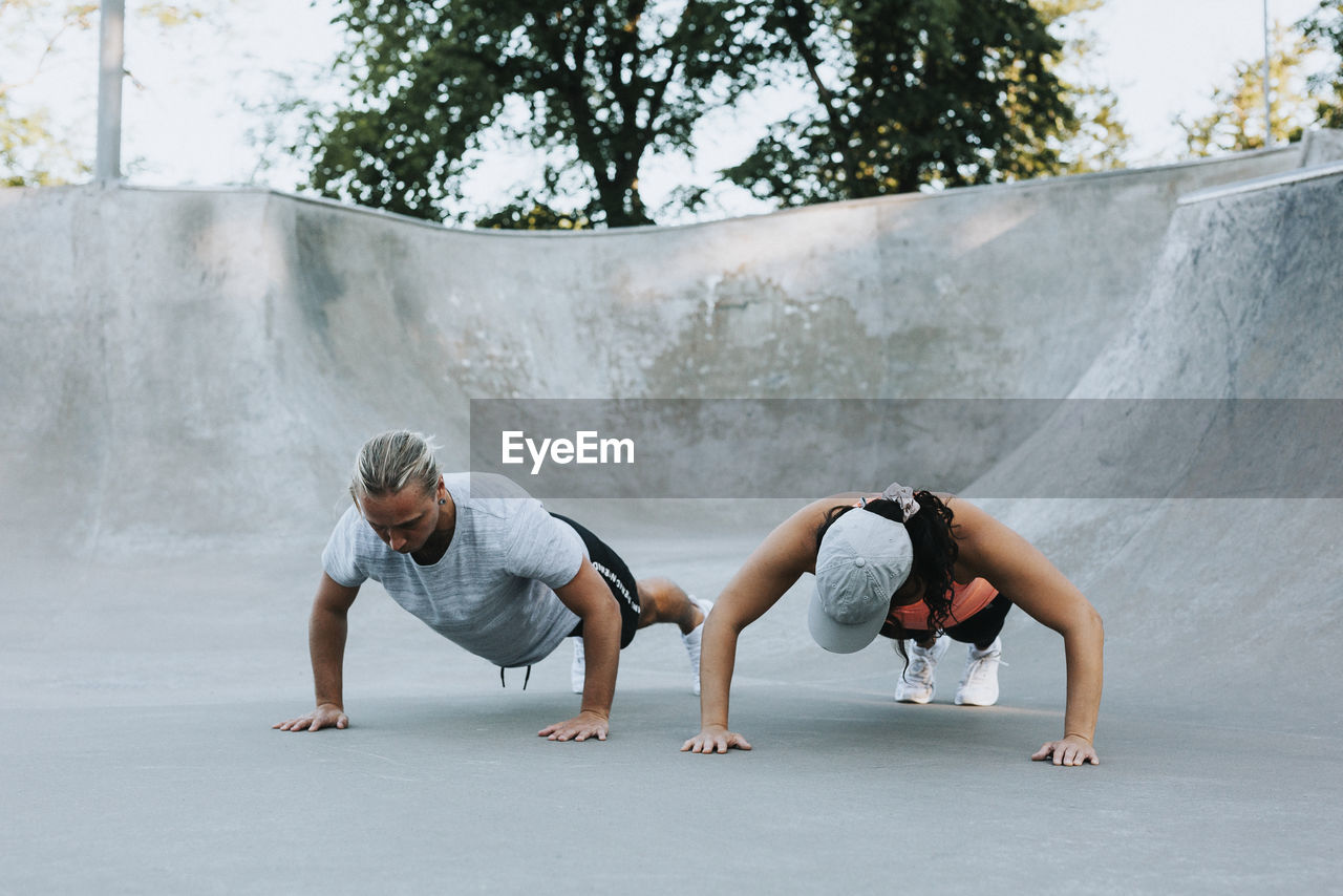 Couple doing push-ups together