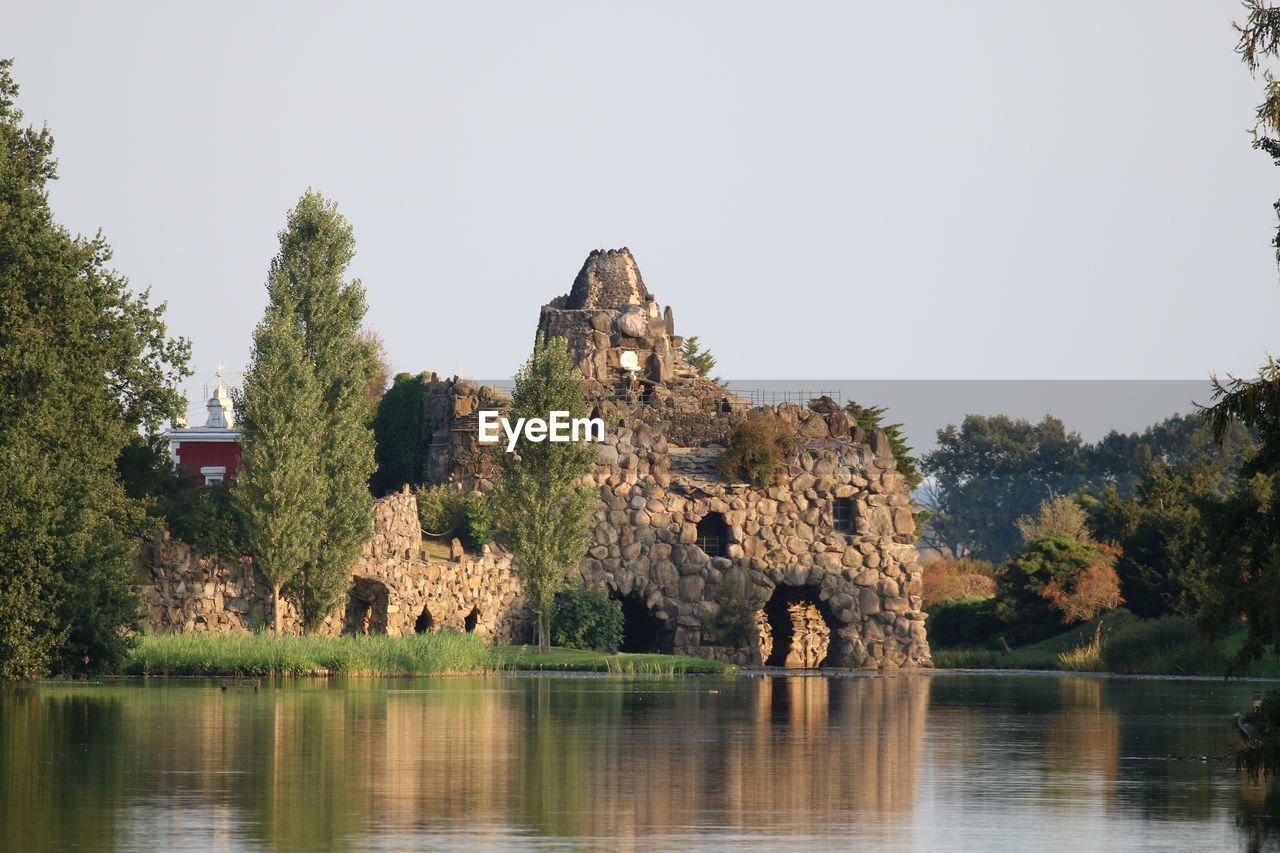 Panoramic view of lake against clear skyand ruin