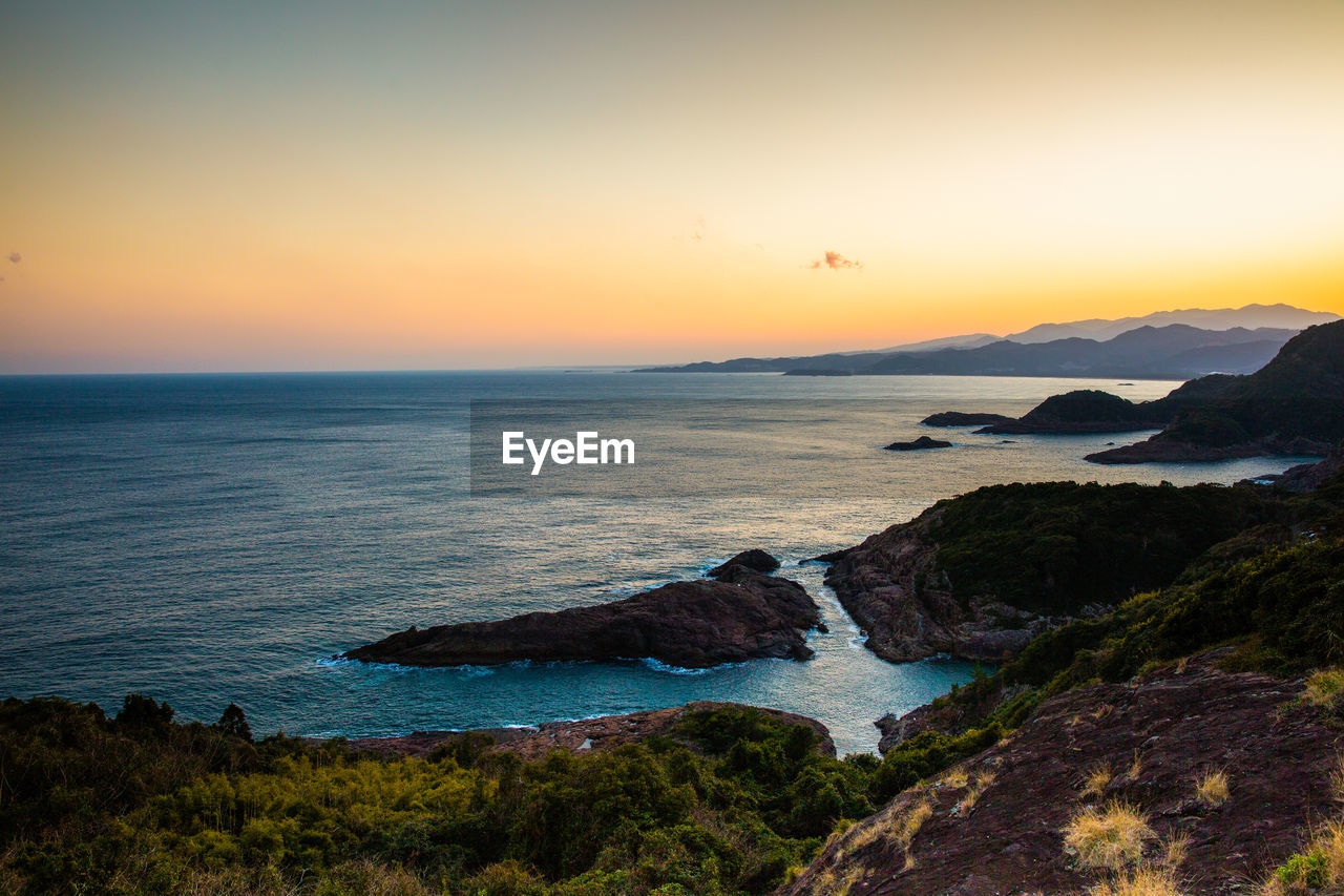 Scenic view of sea against sky during sunset