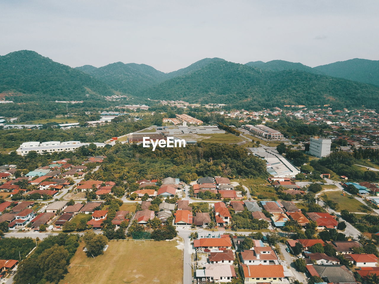 High angle view of residential district against sky