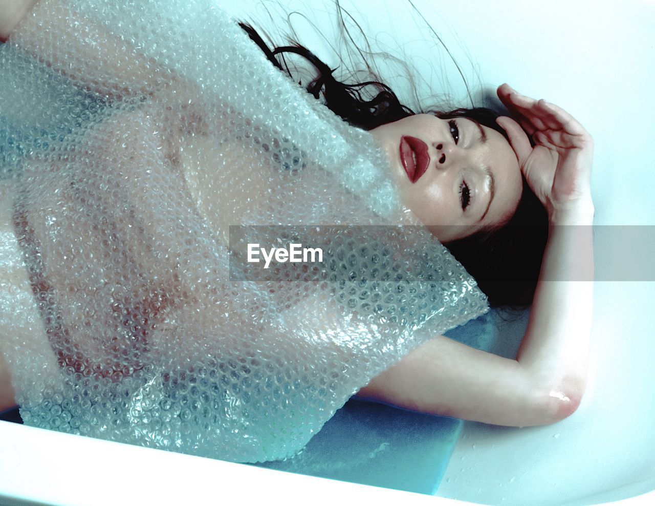 High angle portrait of woman in bathtub