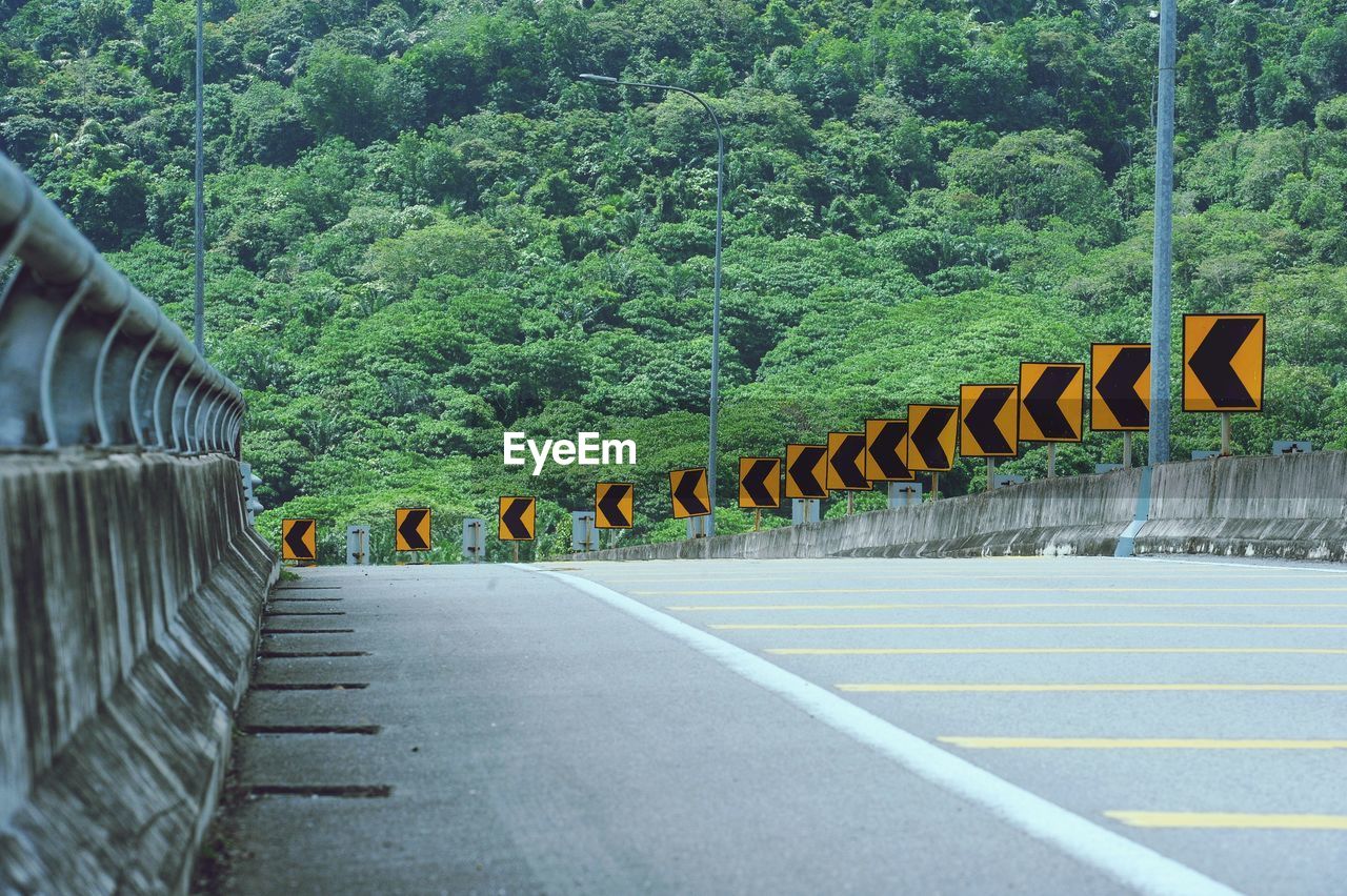 Rows of signboards indicating the direction of the bend so be careful on the road