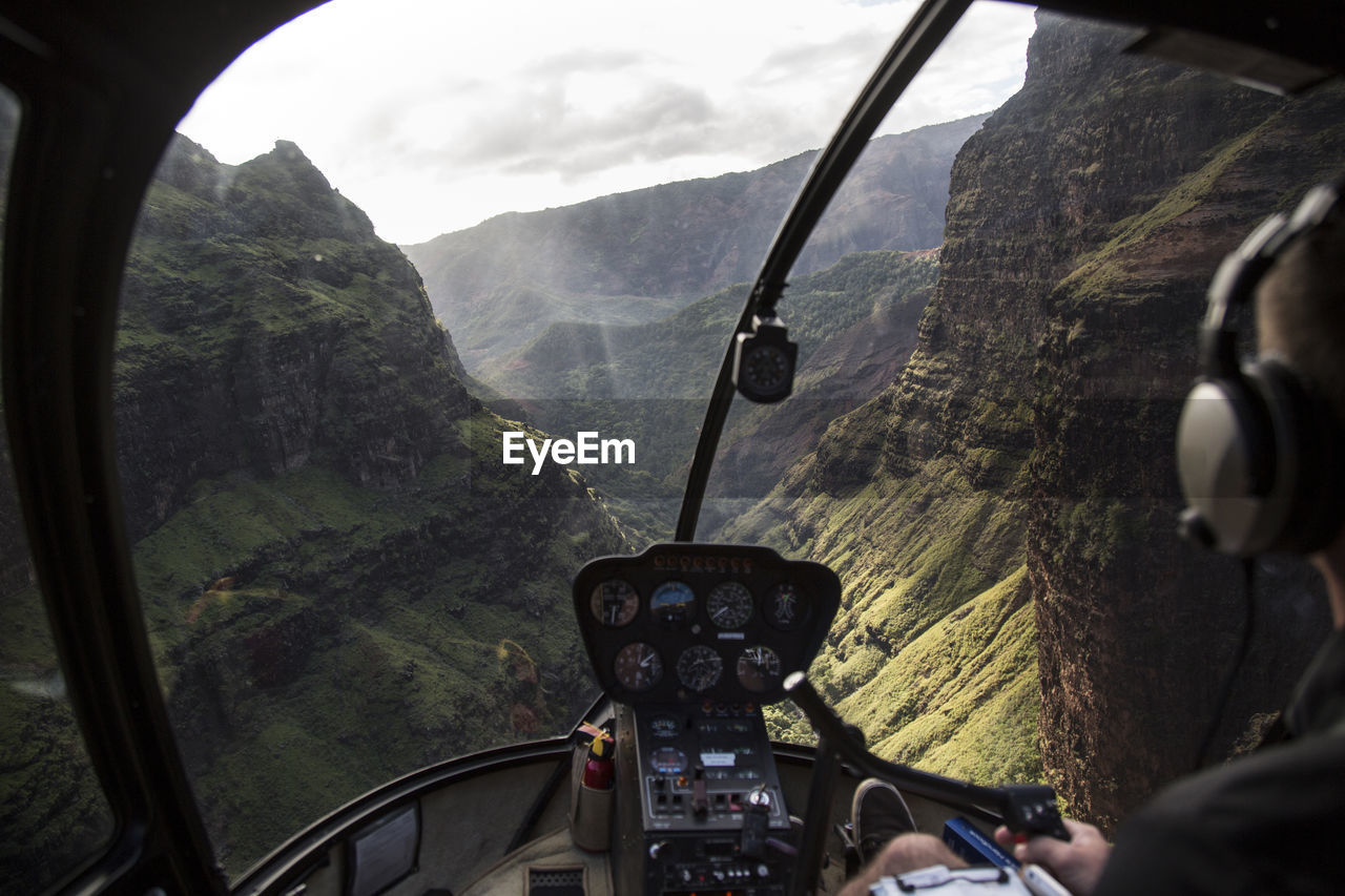 Lokkout of helicopter cockpit during flight in the waimea canyon - kauai