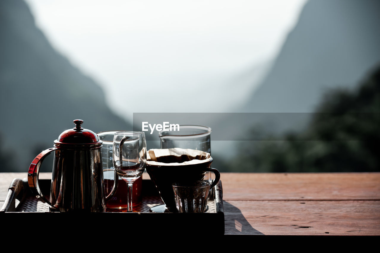 CLOSE-UP OF DRINK ON TABLE